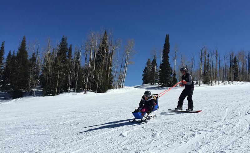 Adaptive snow skiing