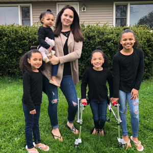 Chelsea Hill with her daughters