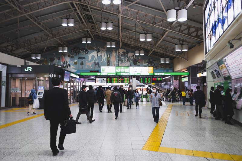 Yellow textured pavement in a Japanese train station