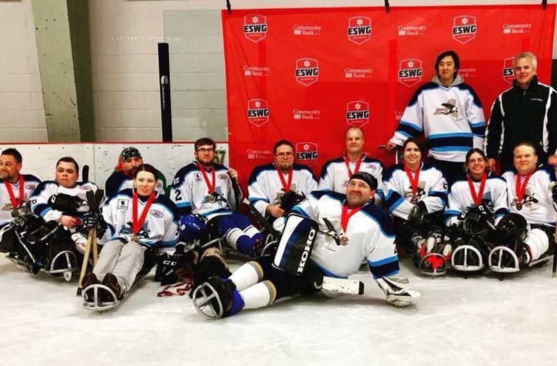 CNY Flyers sled hockey team