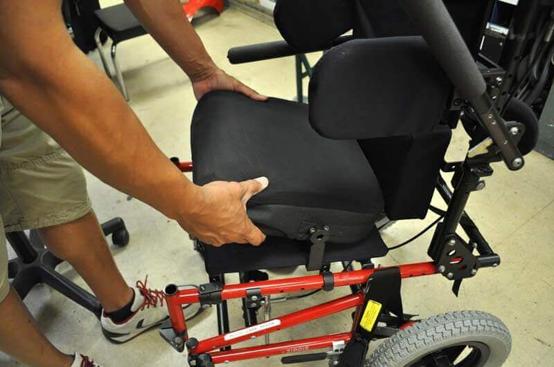 Adjusting a wheelchair cushion