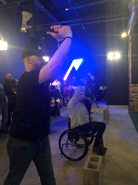 Jess and Jason throwing axes