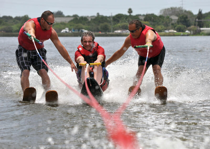 Men water skiing