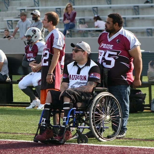 Stephen coaching his football team