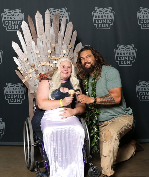 Melissa Weisser cosplaying alongside actor Jason Momoa