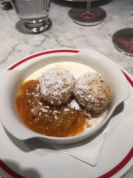 Cottage cheese dumpling, walnut crumb, sweetened sour cream, and homemade apricot jam